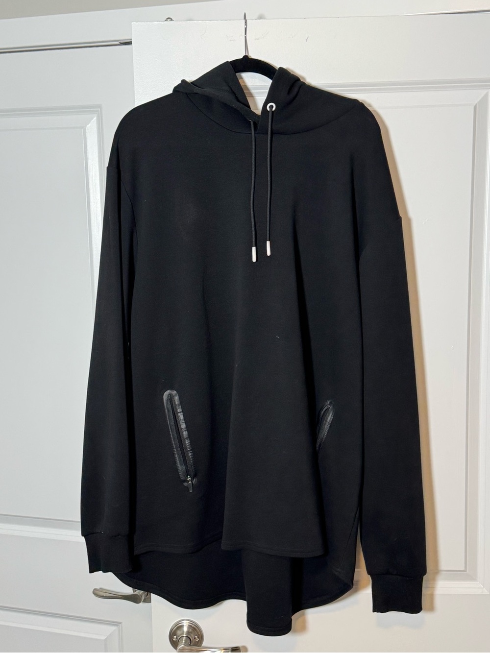 Black Pullover Hoodie with Zippered Pockets